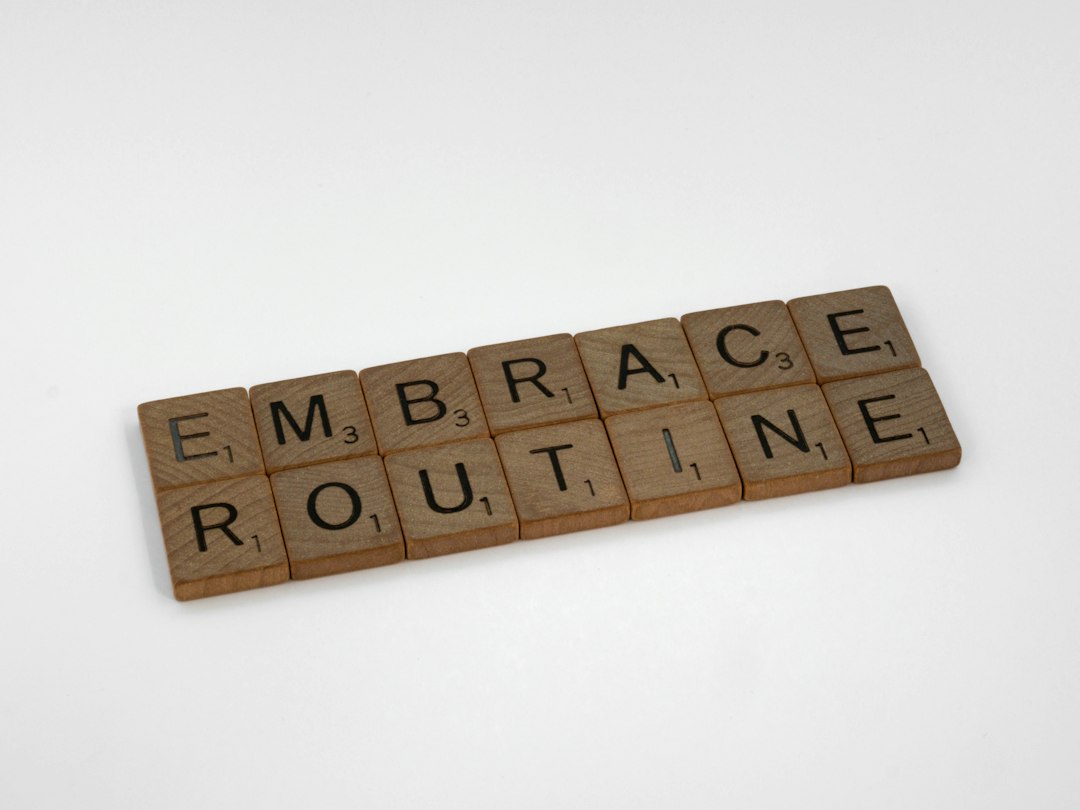 our-story scrabble, scrabble pieces, lettering, letters, wood, scrabble tiles, white background, words, quote, letters, type, typography, design, layout, focus, bokeh, blur, photography, images, image, embrace routine, routine, regimen, discipline, grind, chores, ordinary, get things done, empty what is full, fill what is empty,